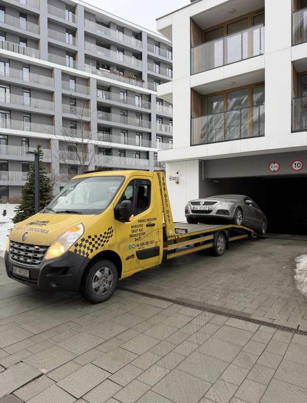 Laweta Renault — holowanie Volkswagena z garażu podziemnego Warszawa